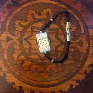 Art Deco diamond dress watch with sapphire crown